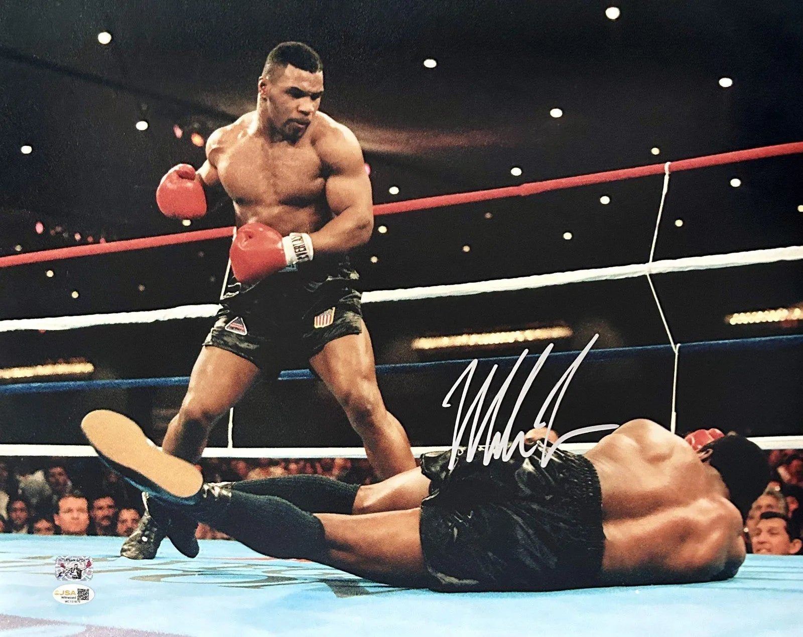 Mike Tyson Signed Boxing Image JSA: Tyson Knocking Out Trevor Berbick (Framed)