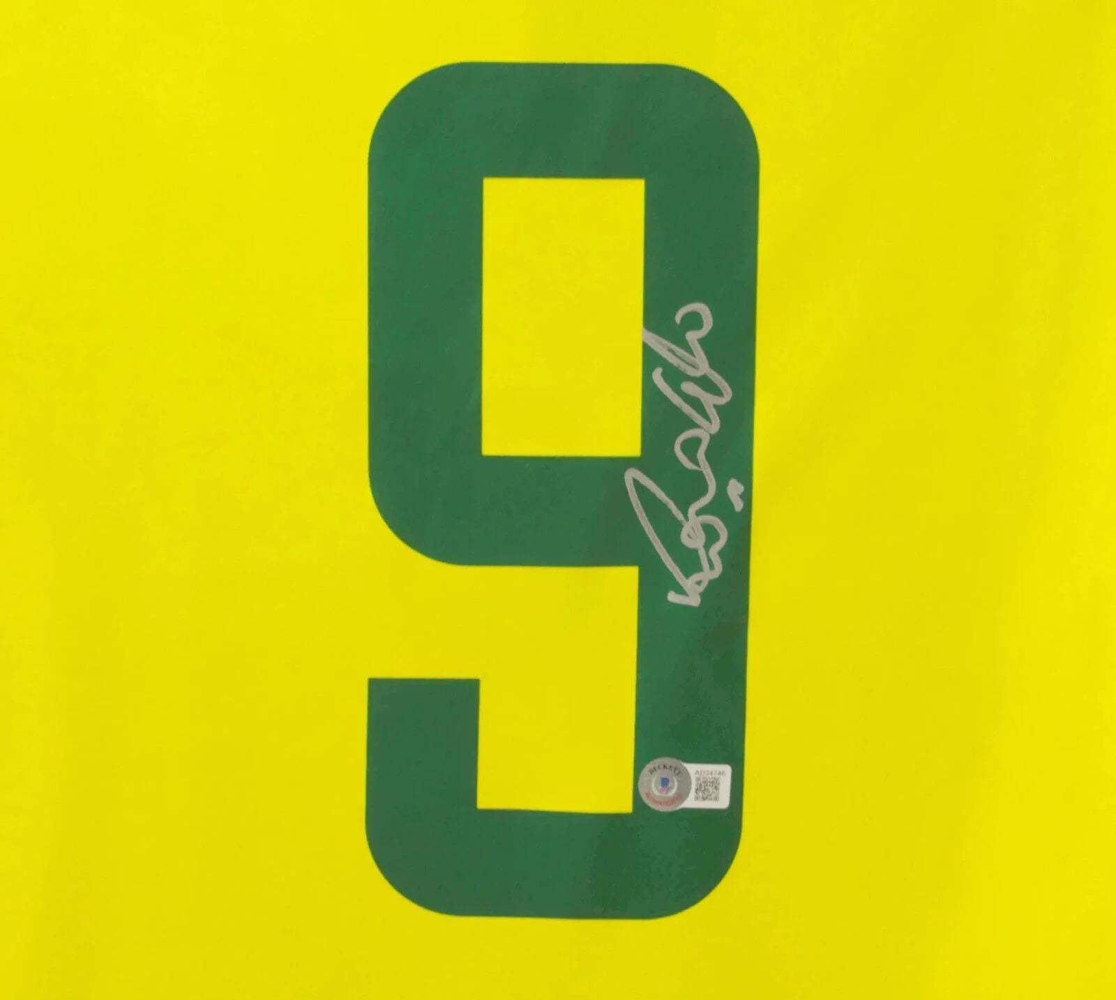 RONALDO NAZARIO SIGNED BRAZIL FC HOME SOCCER JERSEY #9 WITH BECKETT COA